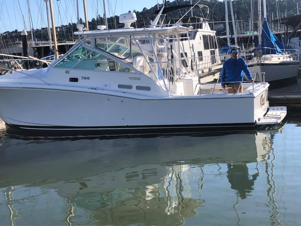 Sport fishing boat docked after full service